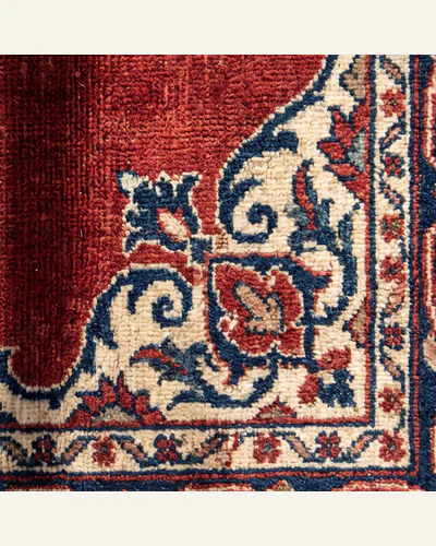 A finely knotted Persian rug with silk highlights, photographed flat.